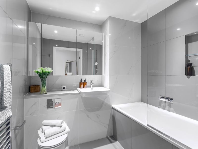 Interior photo of a tiled Bathroom, One Bed Apartment Showhome