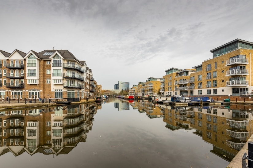 Exterior photo of apartments and canal in Brentford