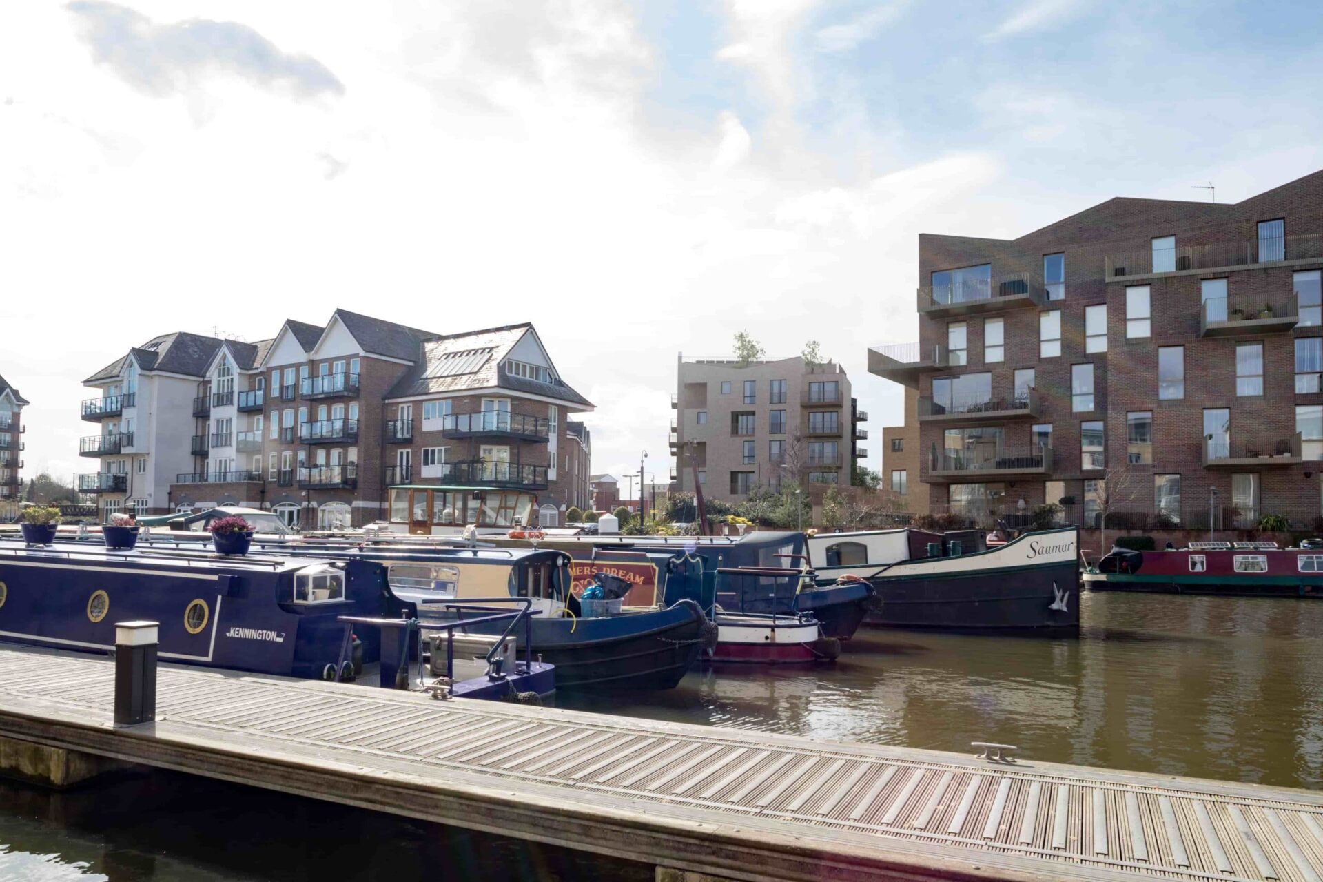 Exterior photo of apartments and canal in Brentford