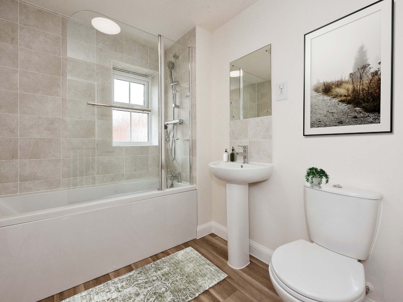 The bathroom image is a CGI dressed representation taken in the actual Plot 87, a three bedroom house at Old Stowmarket Road, Woolpit