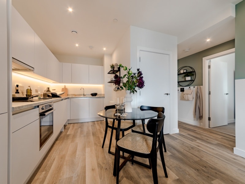 Photograph of plot 1309's kitchen and dining space, which is a one bed apartment at The Acer Apartments in White City, London.
