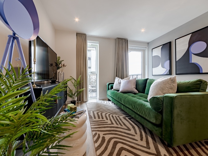 Photograph of plot 1309's lounge space, with a view of the balcony, which is a one bed apartment at The Acer Apartments in White City, London.