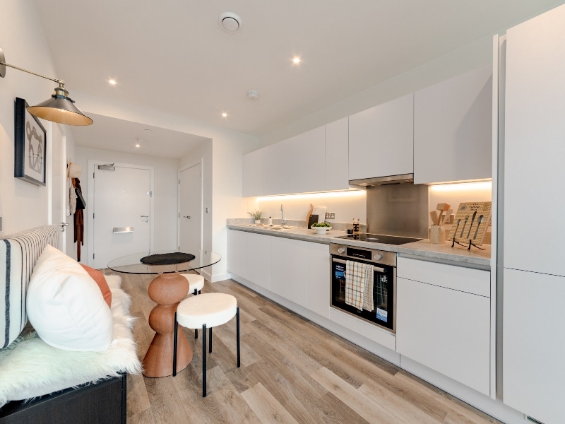Photograph of plot 1502's kitchen-diner area, which is a studio apartment at The Acer Apartments in White City, London.