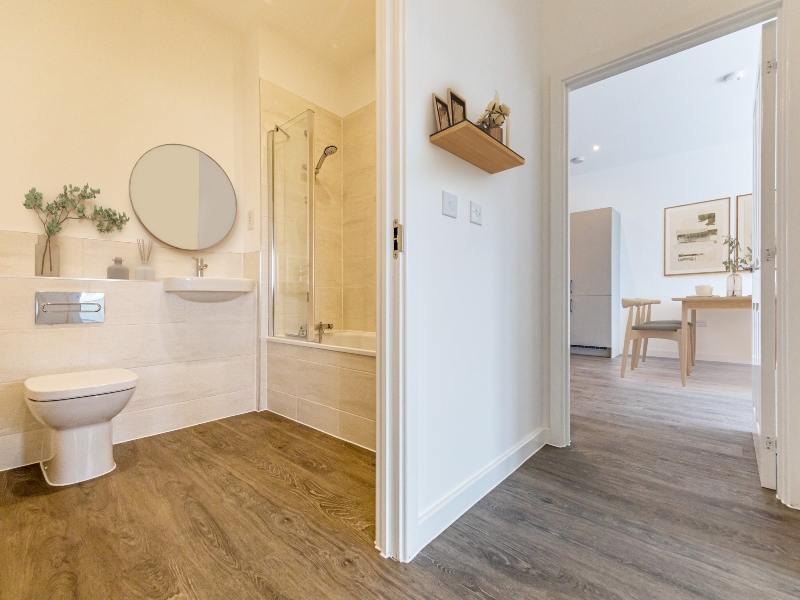 Photo of the bathroom and lounge image shown is a CGI dressed representation taken in the actual plot 90, Two Bed Apartment at Pennicott Place, Godalming