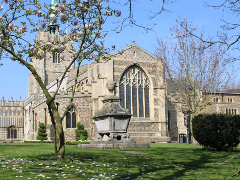 Photo of the exterior of Chelmsford Cathedral showing a large stained glass window