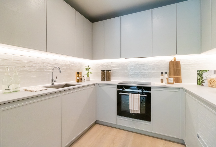 Interior photo of the Show 2 Bed Apartment Plot 21-SO-00-04, kitchen area at East River Wharf in Newham, London
