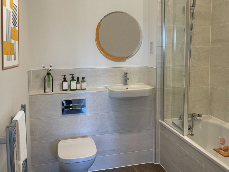 Photo of the bathroom image shown is a CGI dressed representation taken in the actual plot 87, Two Bed Apartment at Pennicott Place, Godalming