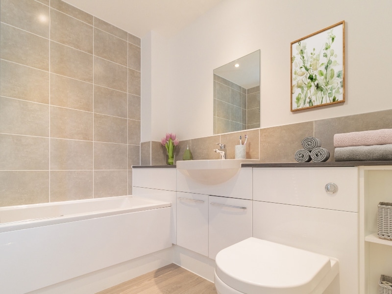 The photo of the bathroom is a CGI dressed interior taken in an actual Three bedroom House at The Havens