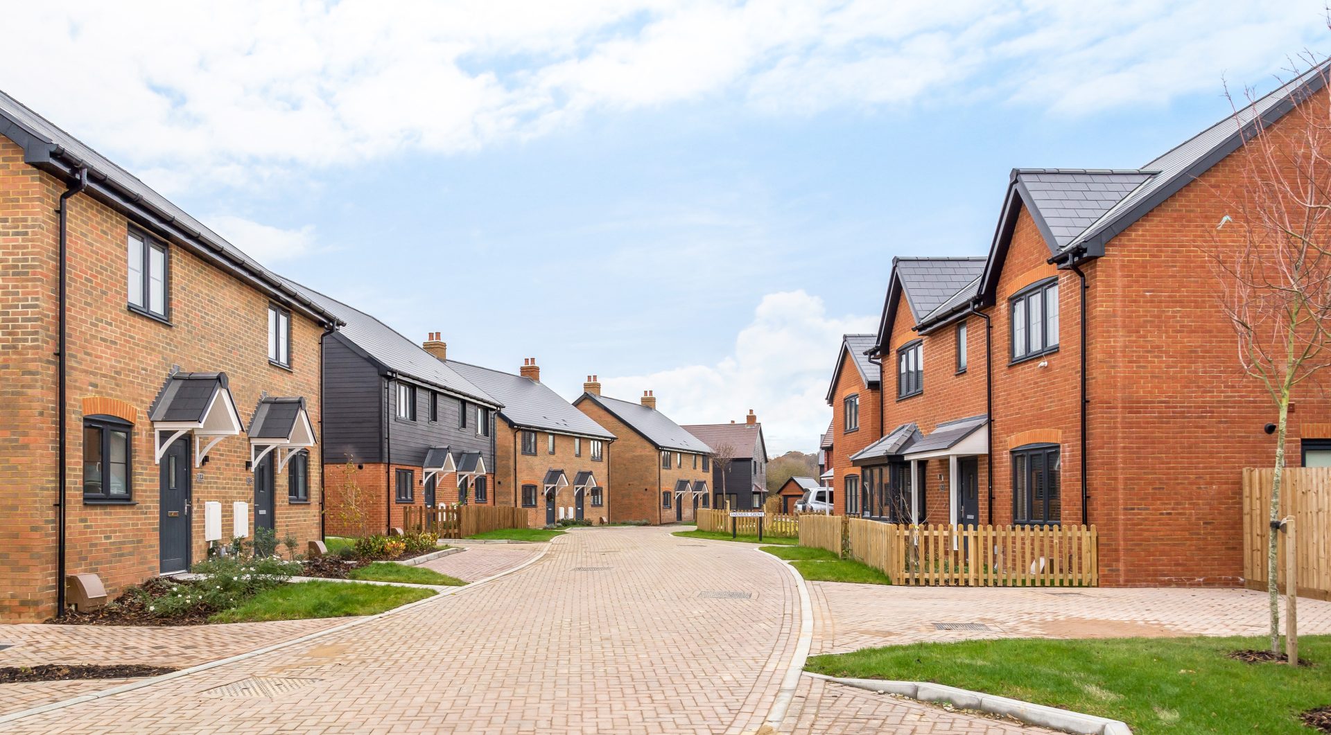 Street Scene of houses and road in The Pippins, Hamstreet, Kent