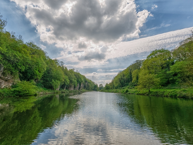 Creswell Crags, a natural limestone gorge in Nottinghamshire, England, containing caves that were occupied by humans during the last Ice Age.