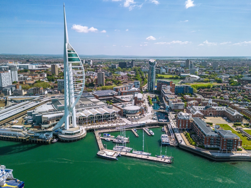 Aerial photo looking at the Spinnaker Tower building and Gun Wharf development