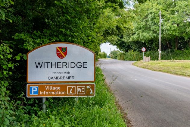 Witheridge Village road sign entering the village