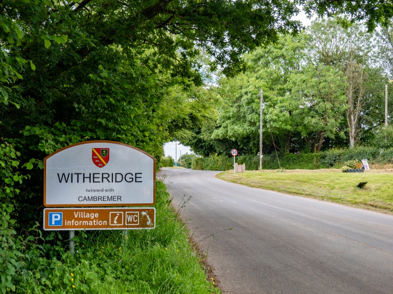 Witheridge Village road sign entering the village