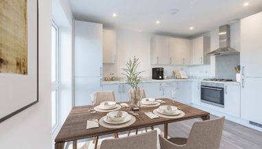 Image is a CGI representation of the kitchen - diner area in the actual Plot 24, Two Bed Shared Ownership Apartment at Woodside Grove, Bagshot, from Legal & General Affordable Homes