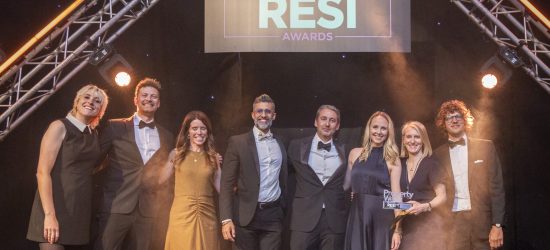 L&G Affordable Home steam accepting their award at the 2026 RESI Awards