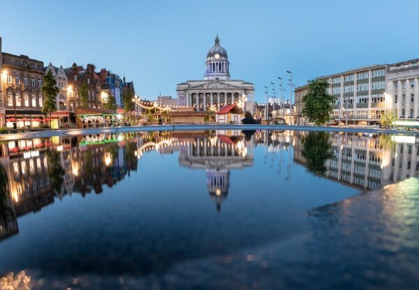 Council House also known as the city hall in the Old Market Square with a pool and fountain in the foreground, Nottingham, Nottinghamshire, England, UK,