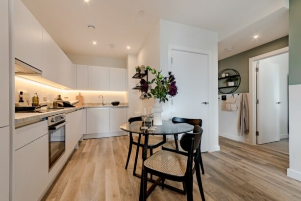 Photograph of plot 1309's kitchen and dining space, which is a one bed apartment at The Acer Apartments in White City, London.