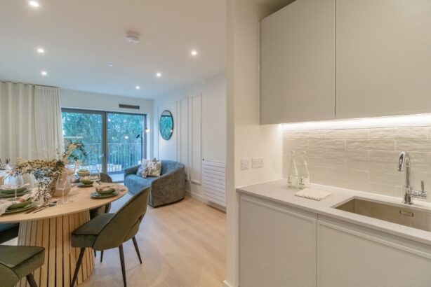 Interior photo of the Show 2 Bed Apartment Plot 21-SO-00-04, lounge and kitchen area at East River Wharf in Newham, London