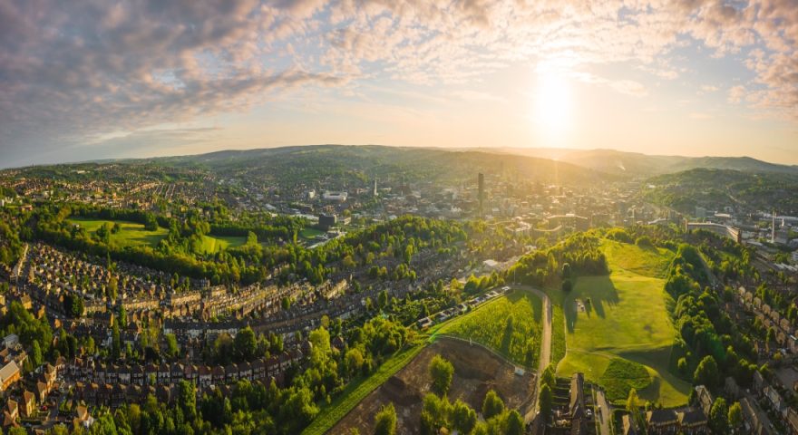 Aerial Panorama of Sheffield City at Sunset with the rolling hills in the background.