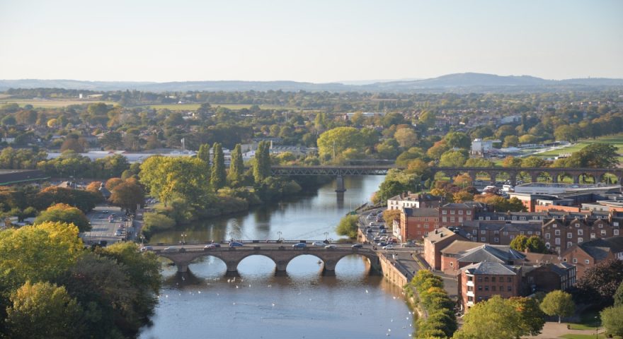 Aerial View of Canals and many bridges in Worcester, Worcestershire, West Midlands on a summers day with rolling hills in the background.